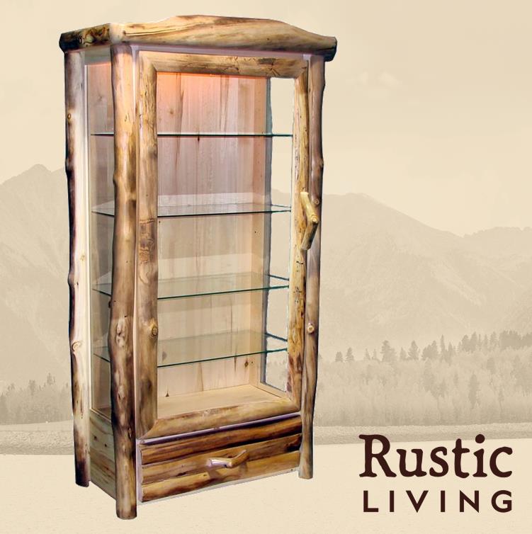 A rustic wooden display cabinet with glass doors and multiple shelves, branded by Rustic Living. Aspen Rustic Log Furniture log 1 drawer display cabinet in log front using solid wood, undermount drawer glides, and soft close drawers and doors custom made for your mountain cabin, lodge, farmhouse, ranch and western lifestyle.