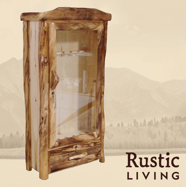 A rustic wooden gun cabinet with a glass door and a drawer. Aspen Rustic Log Furniture log 1 drawer gun cabinet in log front using solid wood, undermount drawer glides, and soft close drawers and doors custom made for your mountain cabin, lodge, farmhouse, ranch and western lifestyle.