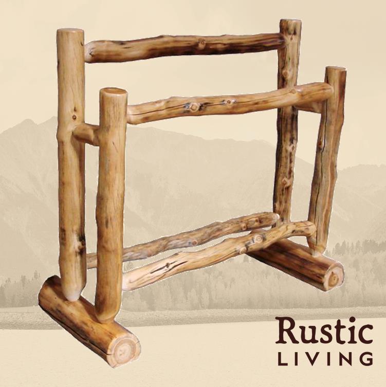 A two-tier quilt rack made of rustic wooden logs.