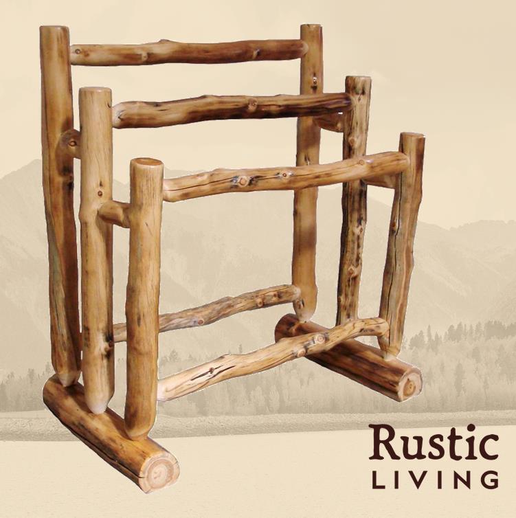 A three-tier quilt rack made of rustic wooden logs.