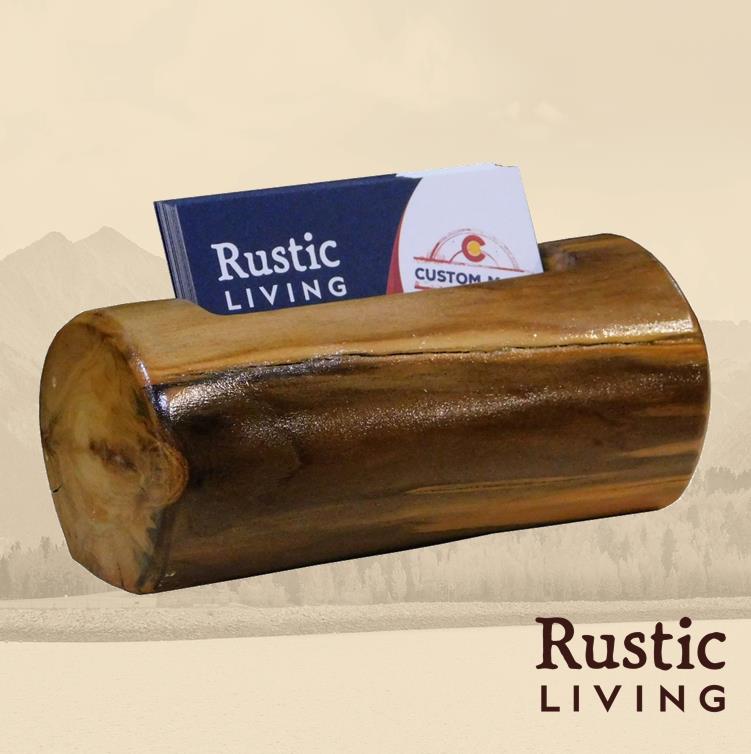 Rustic business card holder crafted from a natural wood log, featuring a smooth, carved slot for holding cards and showcasing rich wood grain and handcrafted charm—perfect for a cabin-themed desk or office.