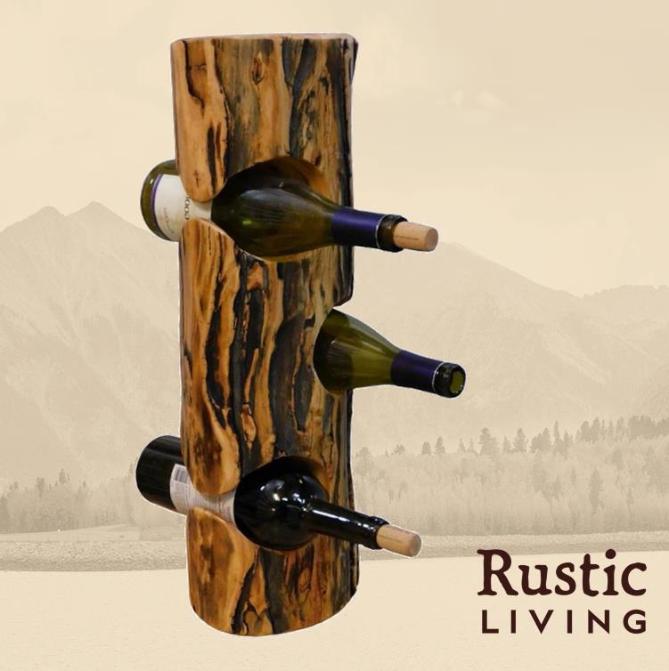 A rustic wooden wine stump with bottles resting on it.