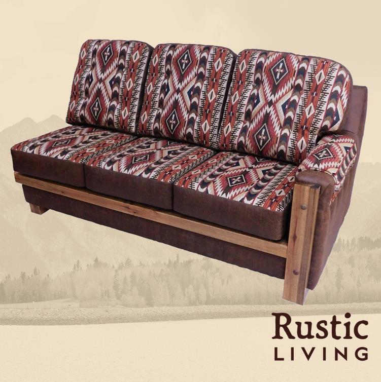 A rustic style sofa with a patterned red and brown fabric on the cushions, featuring a wooden frame.